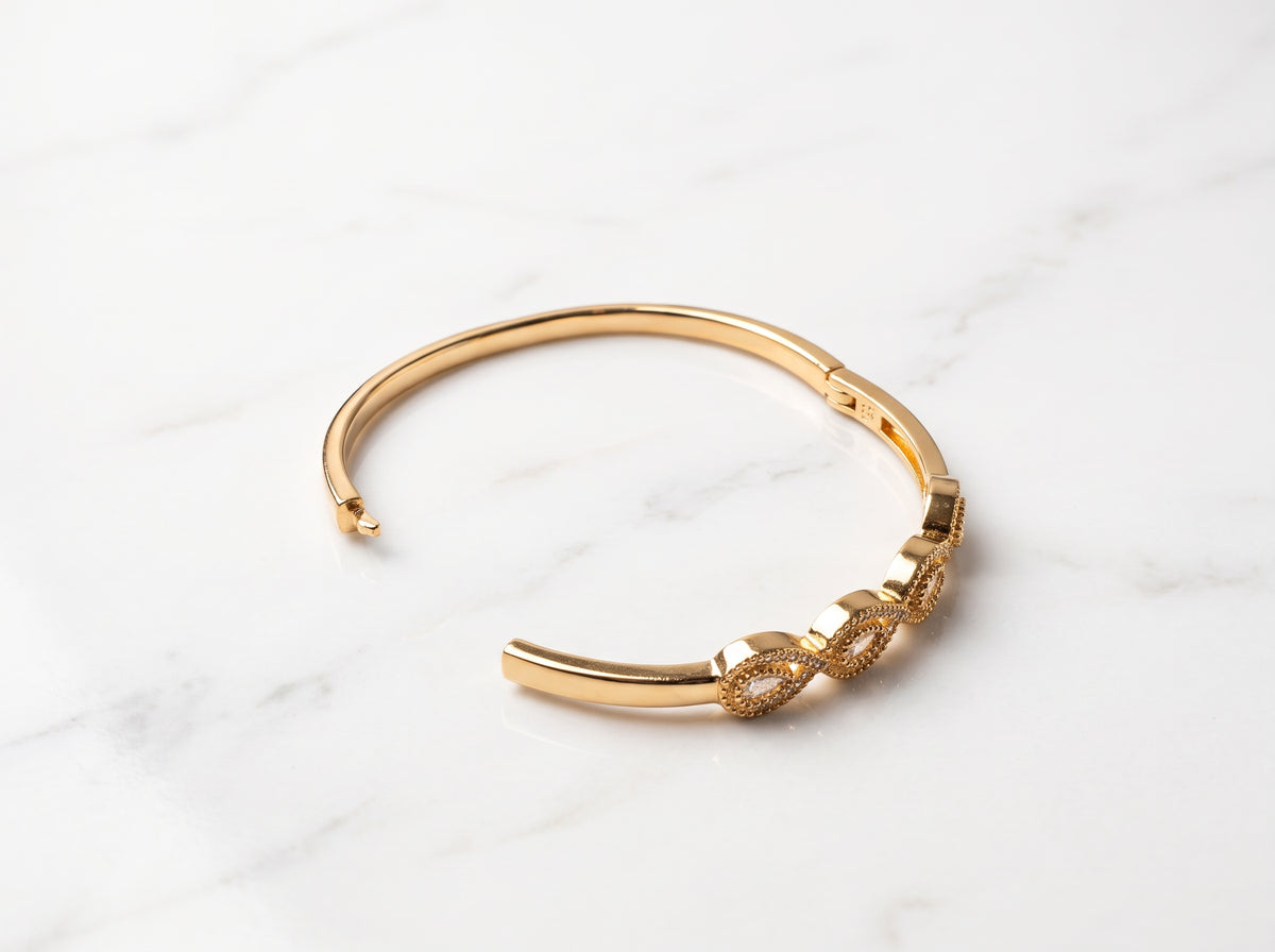 Gold Plated Teardrop Zircon Hinged Bracelet