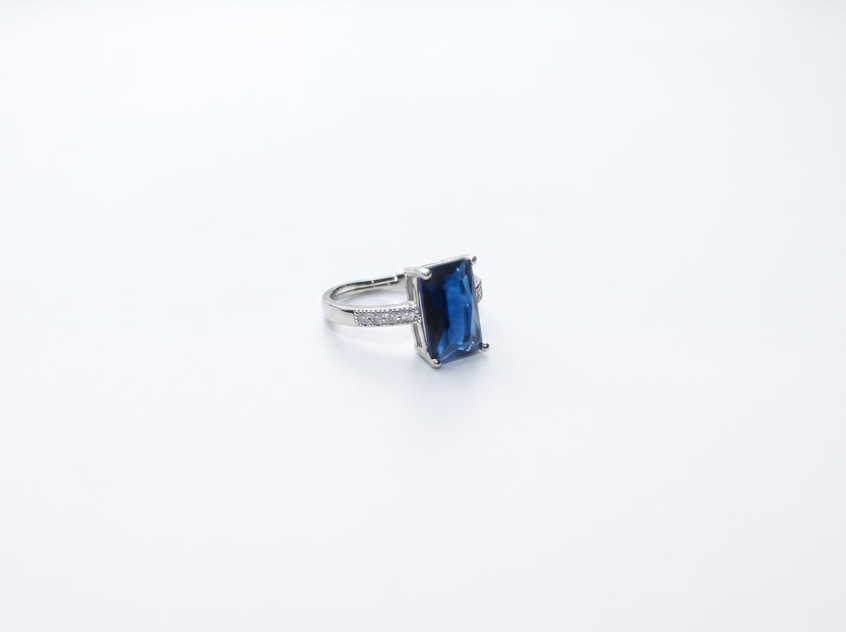 Silver Emerald-Cut Sapphire Blue Zircon Pavé Band Ring